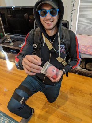 Anthony in light cosplay of Death Stranding