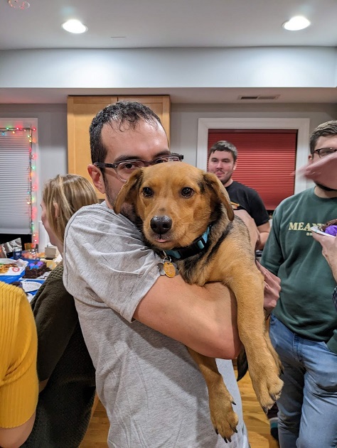 Anthony holding Cora